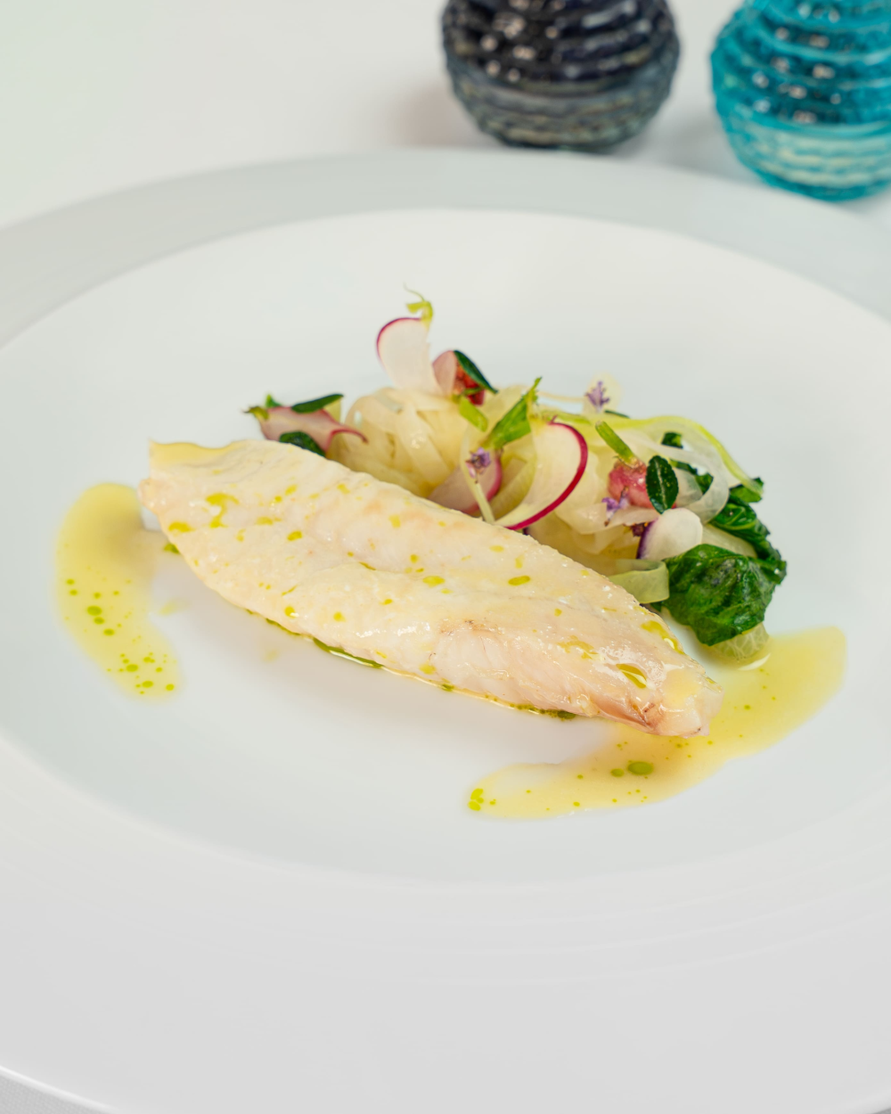John Dory cooked on the bone with fig leaves, root vegetables and an acidulated jus €195